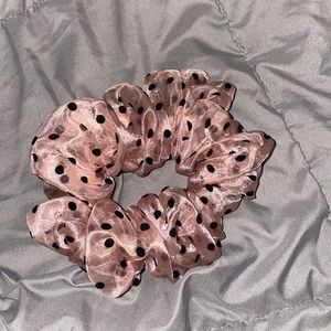 Pink polkadotted jumbo scrunchie